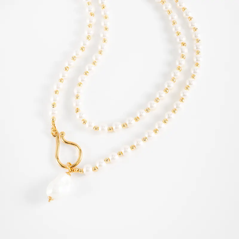 Collar doble de perlas con cierre dorado